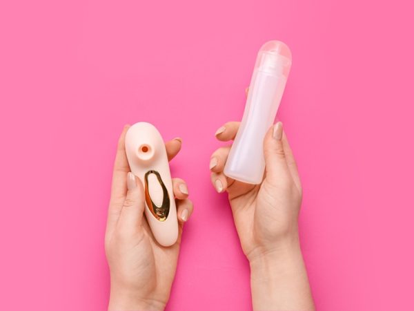 moaning young hispanic woman getting sexual pleasure, orgasm, top view portrait. erotic, sex, masturbation